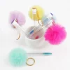 cepillopompon-1 Tubo con Cepillo, Aro de Llavero y Pompón