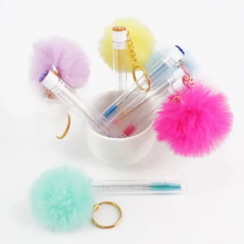 cepillopompon-1 Tubo con Cepillo, Aro de Llavero y Pompón