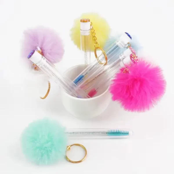 cepillopompon-1 Tubo con Cepillo, Aro de Llavero y Pompón